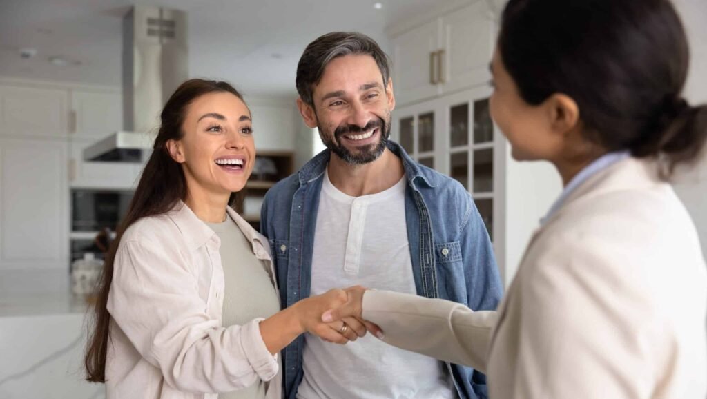 Accommodation,Rent,Agent,And,Couple,Of,Tenant,Shaking,Hands,In