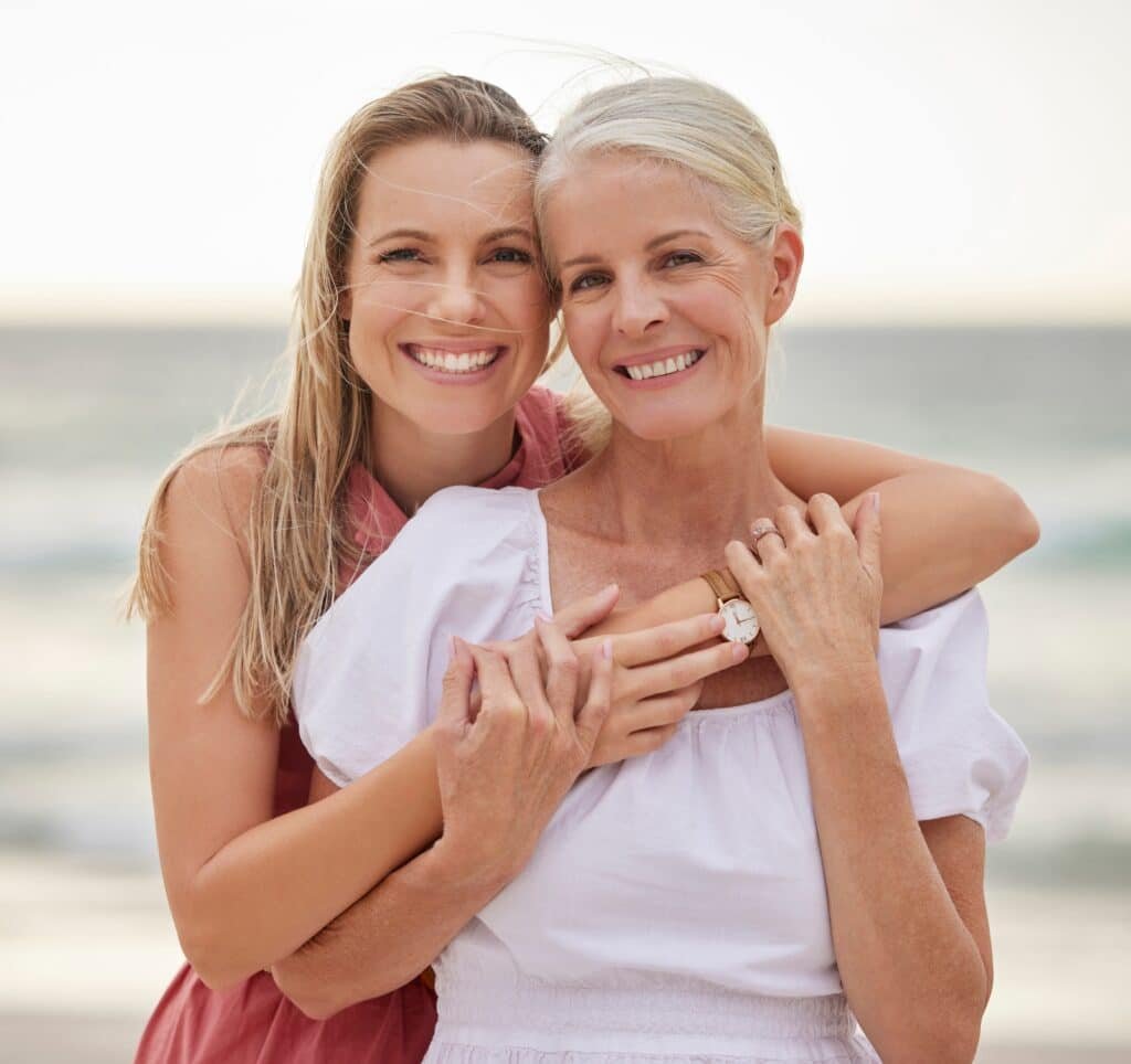 Portrait,,Beach,And,Hug,With,Mother,,Daughter,And,Travel,With